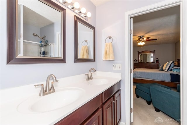 2385 Gerard Ct, Fairborn, OH 45324 - full bath featuring ensuite bathroom, double vanity, and a ceiling fan