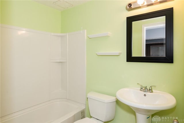2385 Gerard Ct, Fairborn, OH 45324 - bathroom featuring a sink, toilet, and shower / washtub combination