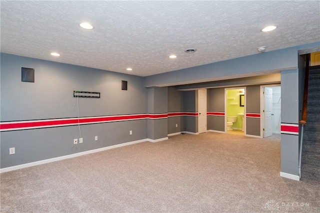 2385 Gerard Ct, Fairborn, OH 45324 - finished below grade area with carpet, stairs, recessed lighting, a textured ceiling, and baseboards