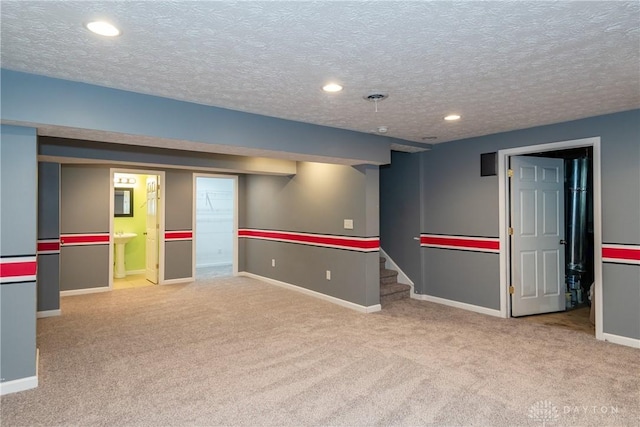 2385 Gerard Ct, Fairborn, OH 45324 - finished basement featuring carpet flooring, baseboards, recessed lighting, a sink, and stairs
