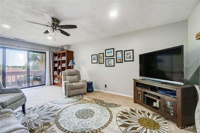 1357 Tattersall Rd Unit 70, Dayton, OH 45459 - carpeted living room with a ceiling fan, a textured ceiling, recessed lighting, and baseboards