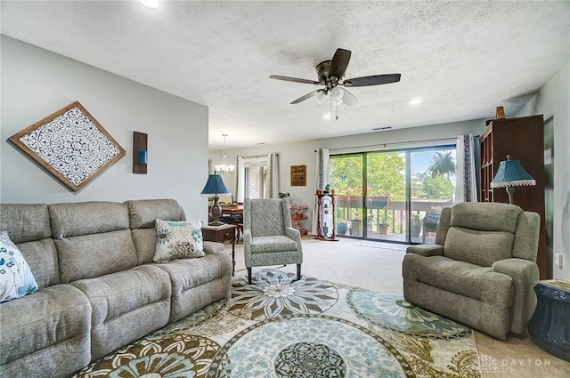 1357 Tattersall Rd Unit 70, Dayton, OH 45459 - living area featuring light colored carpet, ceiling fan, a textured ceiling, recessed lighting, and a chandelier