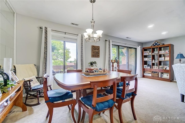 1357 Tattersall Rd Unit 70, Dayton, OH 45459 - carpeted dining space with plenty of natural light, a chandelier, and recessed lighting