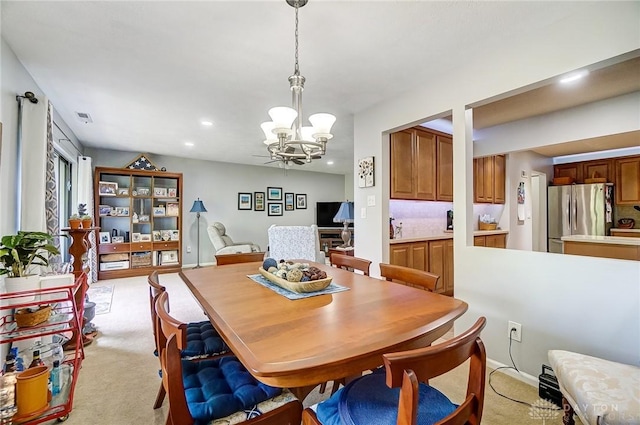 1357 Tattersall Rd Unit 70, Dayton, OH 45459 - dining space with a chandelier, light carpet, and recessed lighting
