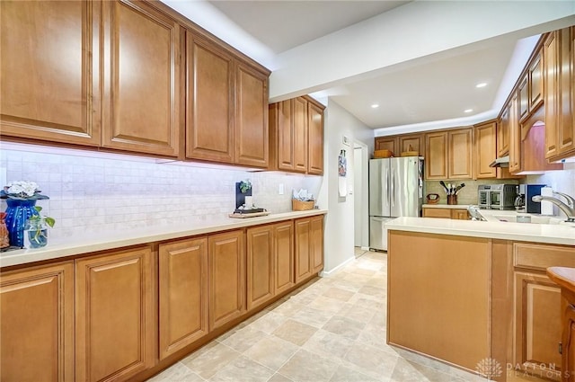 1357 Tattersall Rd Unit 70, Dayton, OH 45459 - kitchen featuring freestanding refrigerator, brown cabinets, and recessed lighting