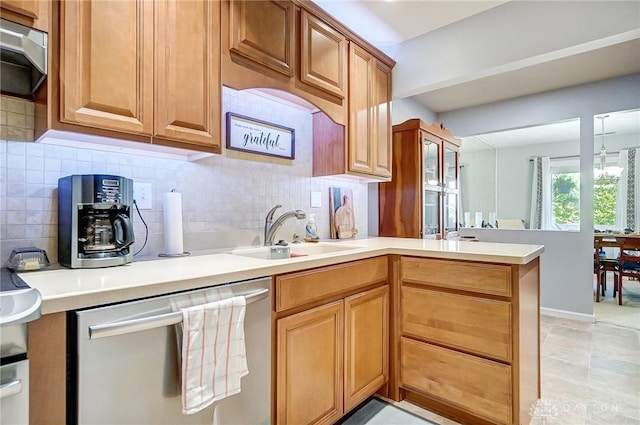 1357 Tattersall Rd Unit 70, Dayton, OH 45459 - kitchen featuring dishwasher, a sink, decorative backsplash, and a peninsula