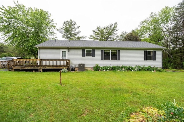 1646 Bell Hollow Rd, Hillsboro, OH 45133 - back of house featuring a deck, a yard, and central AC