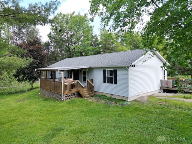 1646 Bell Hollow Rd, Hillsboro, OH 45133 - back of property featuring crawl space, a lawn, a deck, and a shingled roof