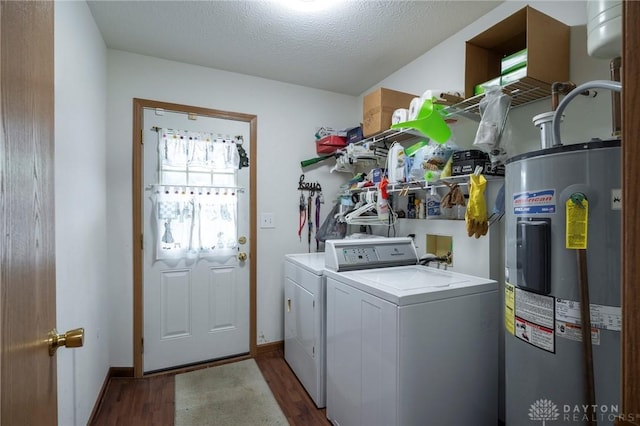 1646 Bell Hollow Rd, Hillsboro, OH 45133 - laundry room featuring electric water heater, washer and dryer, wood finished floors, and baseboards