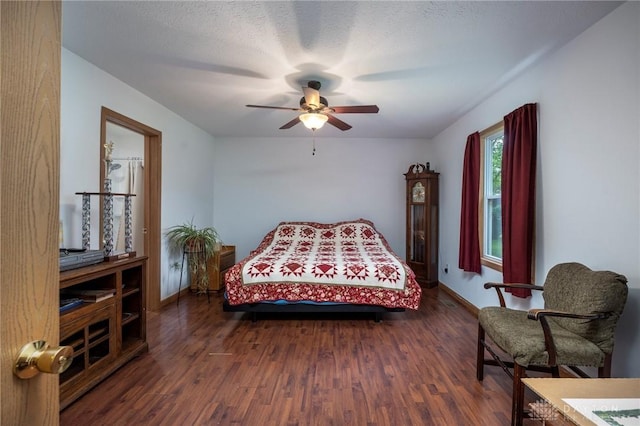 1646 Bell Hollow Rd, Hillsboro, OH 45133 - bedroom featuring dark wood-style flooring, baseboards, and ceiling fan