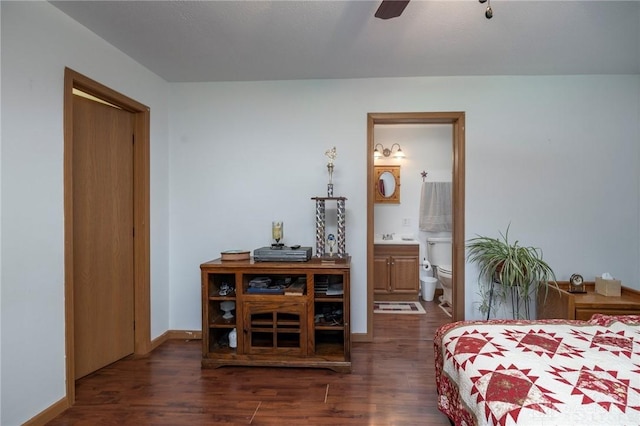 1646 Bell Hollow Rd, Hillsboro, OH 45133 - bedroom with wood finished floors, connected bathroom, baseboards, and a ceiling fan