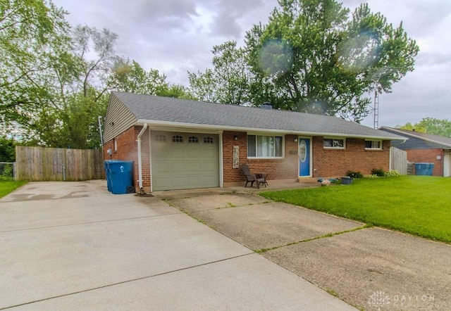 5864 Beecham Dr, Huber Heights, OH 45324 - ranch-style home featuring brick siding, an attached garage, and driveway