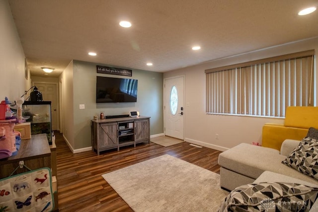 5864 Beecham Dr, Huber Heights, OH 45324 - living area with baseboards, dark wood-style flooring, and recessed lighting