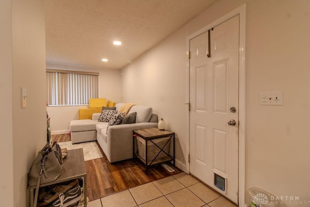 5864 Beecham Dr, Huber Heights, OH 45324 - living room with recessed lighting, tile patterned flooring, and baseboards