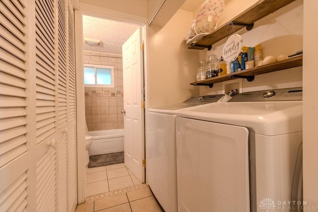 5864 Beecham Dr, Huber Heights, OH 45324 - laundry area featuring light tile patterned flooring and washer and dryer