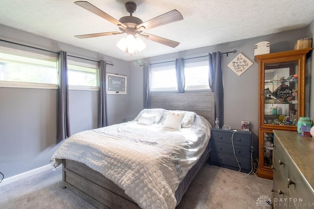 5864 Beecham Dr, Huber Heights, OH 45324 - bedroom featuring light colored carpet, a ceiling fan, and a textured ceiling