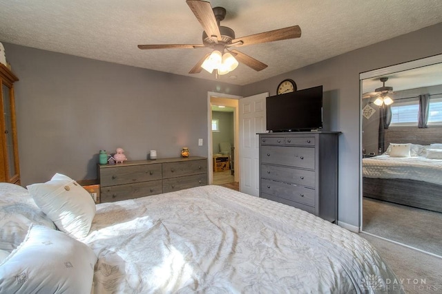 5864 Beecham Dr, Huber Heights, OH 45324 - carpeted bedroom with ceiling fan and a textured ceiling
