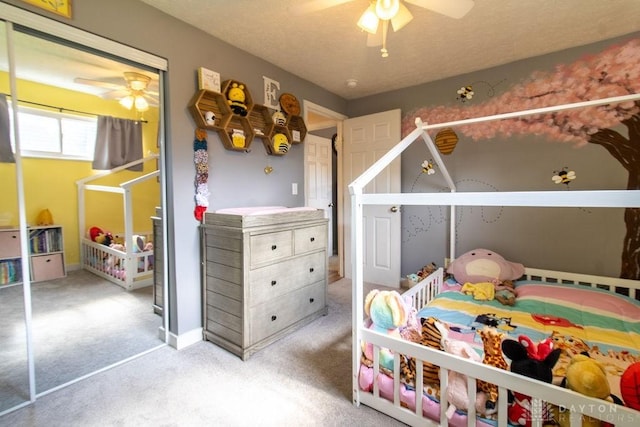 5864 Beecham Dr, Huber Heights, OH 45324 - carpeted bedroom featuring a ceiling fan and a textured ceiling