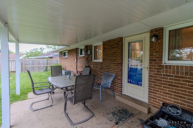 5864 Beecham Dr, Huber Heights, OH 45324 - view of patio / terrace with outdoor dining space, cooling unit, and entry steps