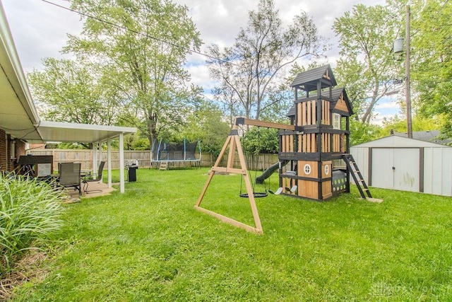 5864 Beecham Dr, Huber Heights, OH 45324 - view of yard with a trampoline and a playground