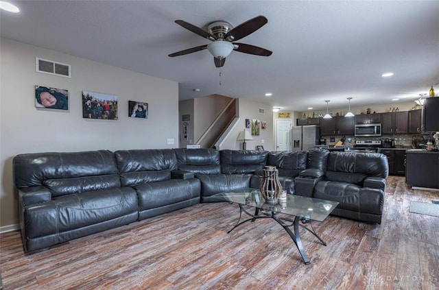 426 Sudbury Dr, Trenton, OH 45067 - living area with light wood-style flooring, stairway, recessed lighting, and ceiling fan