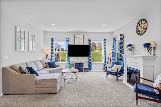 4069 Fawn Crossing Dr, Mason, OH 45040 - carpeted living room with a glass covered fireplace, baseboards, and recessed lighting