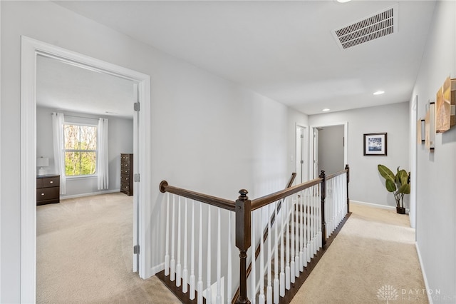 4069 Fawn Crossing Dr, Mason, OH 45040 - hall with carpet floors, an upstairs landing, baseboards, and recessed lighting
