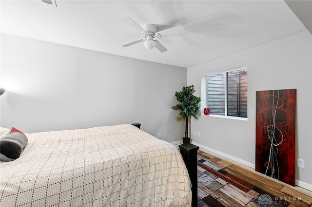 4069 Fawn Crossing Dr, Mason, OH 45040 - bedroom with wood finished floors, baseboards, and ceiling fan