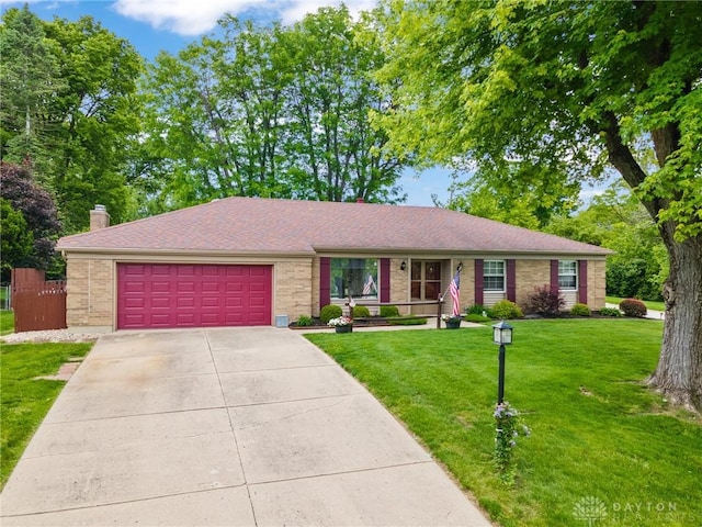 6719 Morrow Dr, Clayton, OH 45415 - single story home with a garage, driveway, brick siding, and a chimney