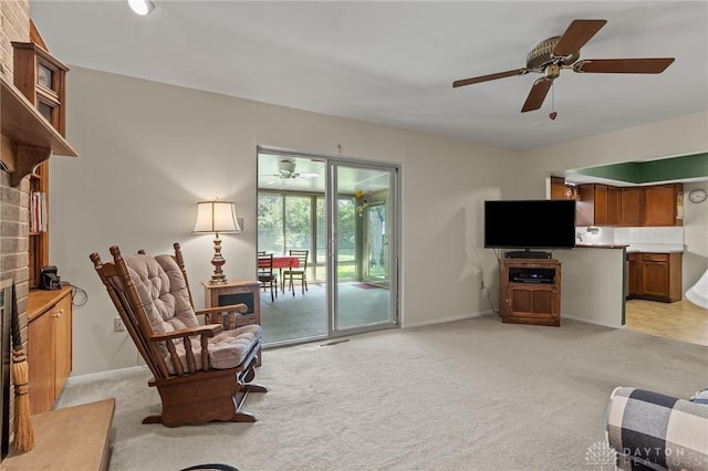 6719 Morrow Dr, Clayton, OH 45415 - living room with light colored carpet, a ceiling fan, and baseboards