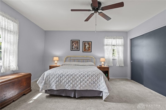 6719 Morrow Dr, Clayton, OH 45415 - bedroom with carpet, a closet, ceiling fan, and baseboards