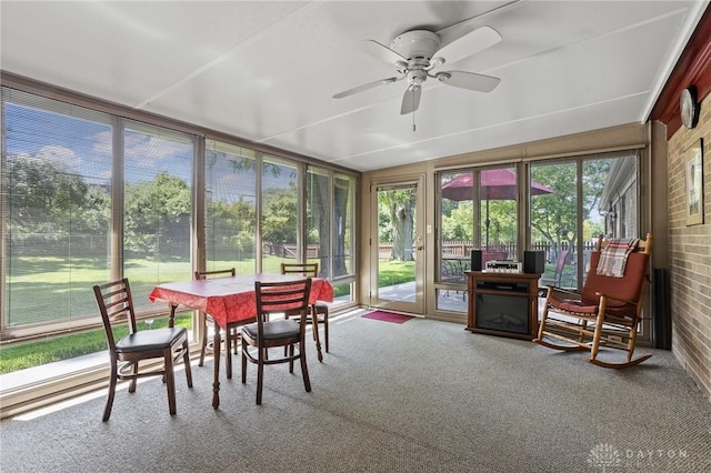 6719 Morrow Dr, Clayton, OH 45415 - sunroom featuring carpet and brick wall