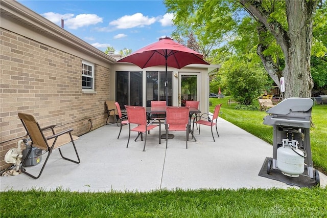 6719 Morrow Dr, Clayton, OH 45415 - view of patio with outdoor dining area and a grill