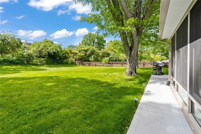 6719 Morrow Dr, Clayton, OH 45415 - view of yard featuring a patio area and view of wooded area