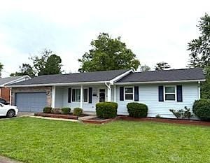 1823 Jackson Ln, Middletown, OH 45044 - ranch-style house featuring a garage and a front yard