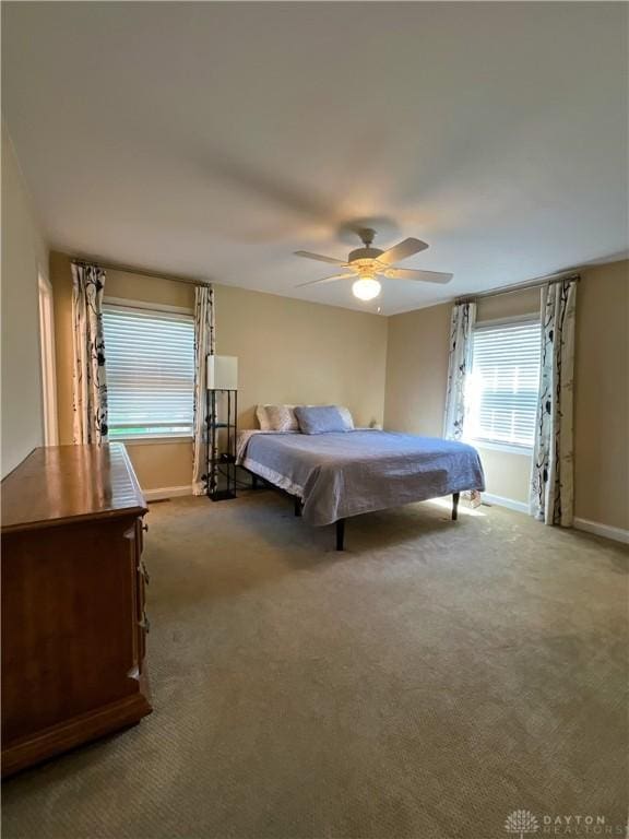 869 Maxwelton, Washington Twp, OH 45459 - carpeted bedroom featuring baseboards and a ceiling fan