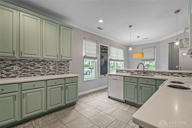 325 Bending Branch Ln, Miamisburg, OH 45342 - kitchen with green cabinets, dishwasher, a sink, decorative backsplash, and crown molding