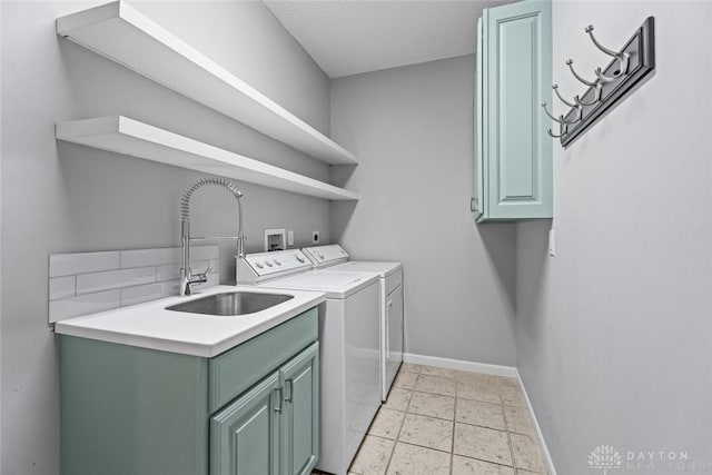 325 Bending Branch Ln, Miamisburg, OH 45342 - washroom featuring cabinet space, washing machine and clothes dryer, and baseboards
