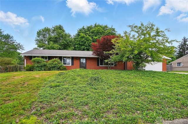 6123 Millbrook Dr, Washington Twp, OH 45459 - view of front of house with a garage, a front lawn, and brick siding