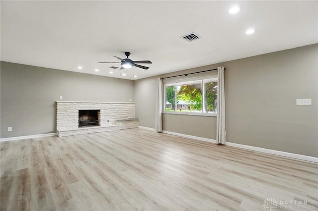 6123 Millbrook Dr, Washington Twp, OH 45459 - unfurnished living room featuring a ceiling fan, recessed lighting, baseboards, a fireplace, and wood finished floors