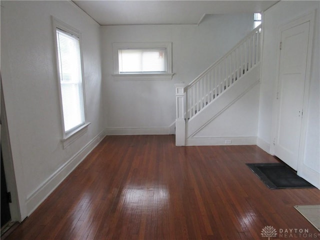 2455 Catalpa Dr, Dayton, OH 45406 - foyer entrance with stairs, hardwood / wood-style floors, and baseboards
