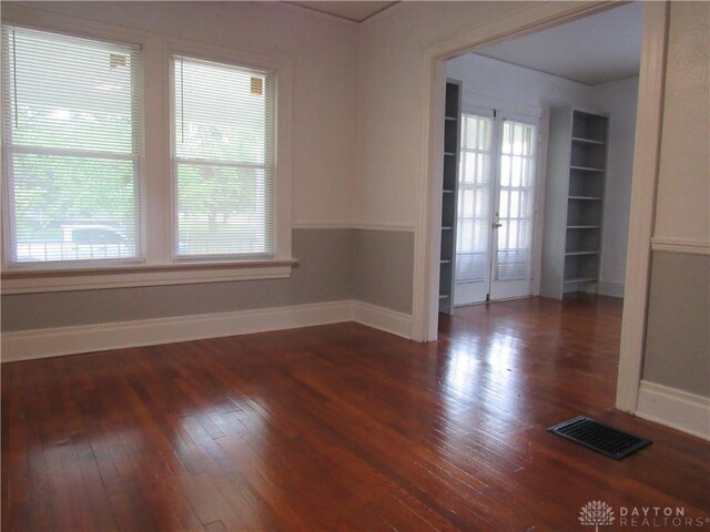 2455 Catalpa Dr, Dayton, OH 45406 - spare room featuring hardwood / wood-style floors, baseboards, and french doors