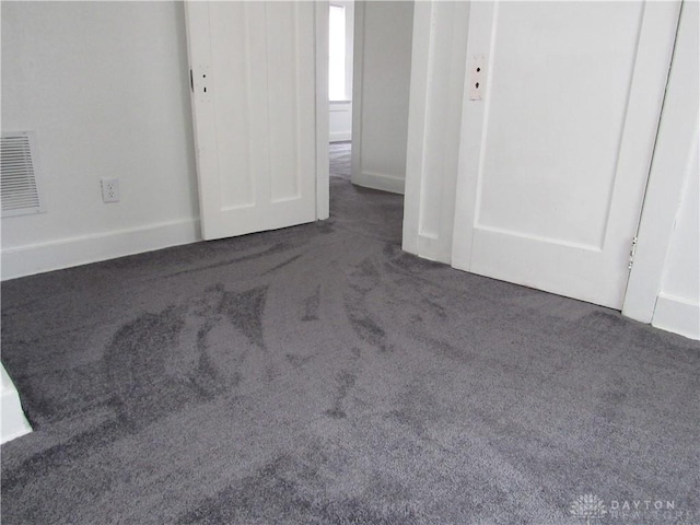 2455 Catalpa Dr, Dayton, OH 45406 - unfurnished bedroom with carpet floors and baseboards