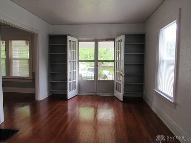 2455 Catalpa Dr, Dayton, OH 45406 - unfurnished room with dark wood-type flooring, baseboards, and french doors