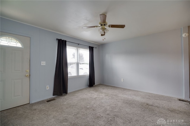1115 Richard Dr, Xenia, OH 45385 - carpeted entryway featuring ceiling fan and baseboards