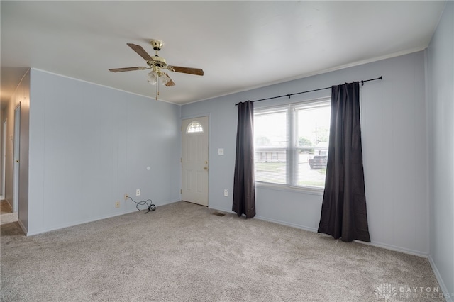 1115 Richard Dr, Xenia, OH 45385 - carpeted empty room with a ceiling fan, ornamental molding, and baseboards