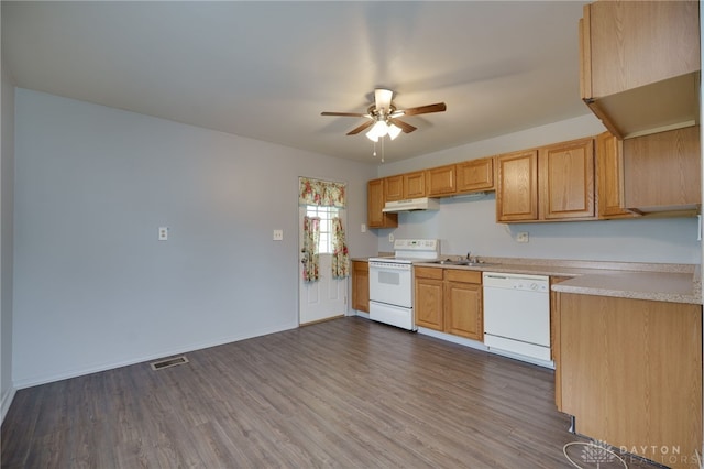 1115 Richard Dr, Xenia, OH 45385 - kitchen with white appliances, a ceiling fan, light countertops, dark wood-type flooring, and under cabinet range hood