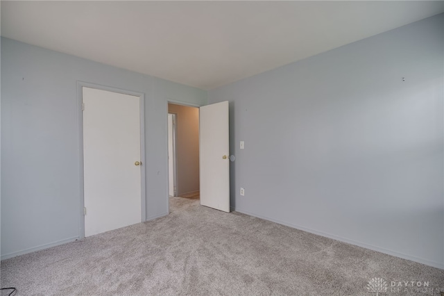 1115 Richard Dr, Xenia, OH 45385 - spare room featuring light colored carpet