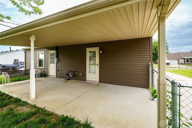 1115 Richard Dr, Xenia, OH 45385 - view of patio / terrace featuring an attached carport