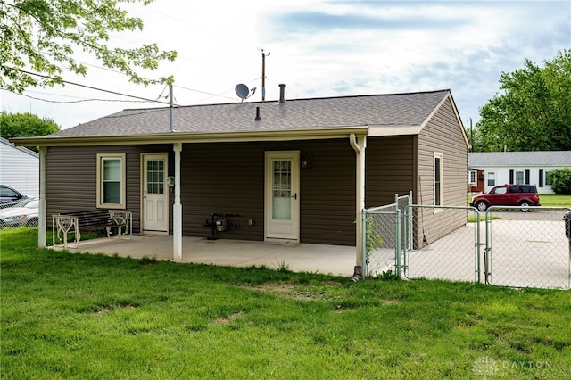 1115 Richard Dr, Xenia, OH 45385 - rear view of property with a patio, a gate, and a shingled roof